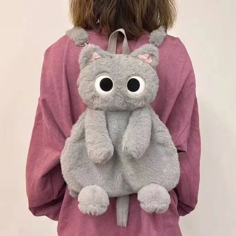 Zaino peluche gatto nero con occhi gialli, morbido e adorabile, perfetto per uno stile unico.
